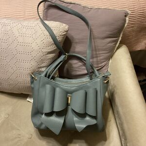 Elegant Blue Bow Accent Handbag